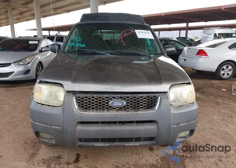 2004 Ford Escape Xlt z USA, uszkodzony, nr VIN 1FMYU93104KB26669